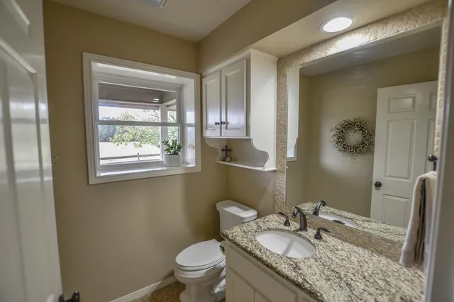 a view of a yard with an outdoor space