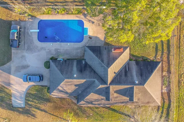 a living room with chairs