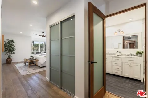 a room with a bed and furniture