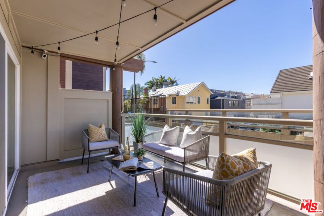 4300 Vía Dolce, Unit 102 Marina del Rey, CA 90292 - Photo 35 of 39 a view of a roof deck with couches