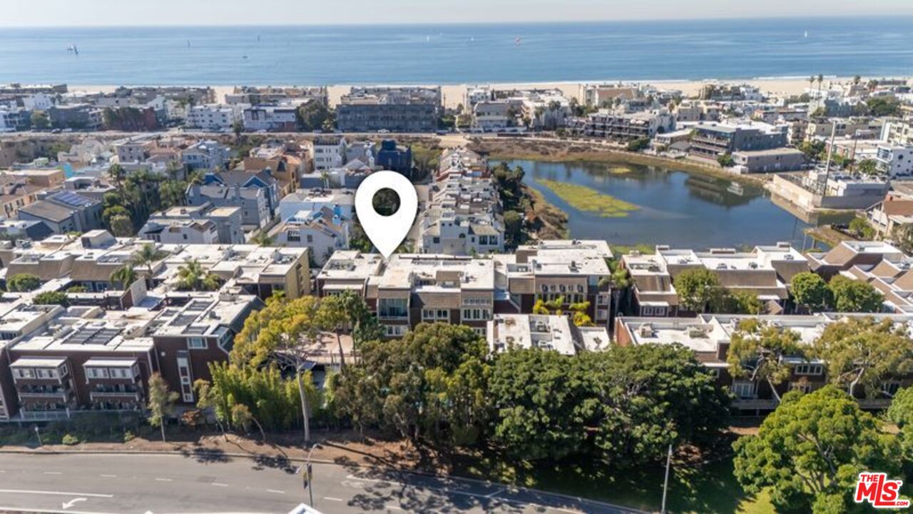 4300 Vía Dolce, Unit 102 Marina del Rey, CA 90292 - Photo 39 of 39 an aerial view of a house with a swimming pool