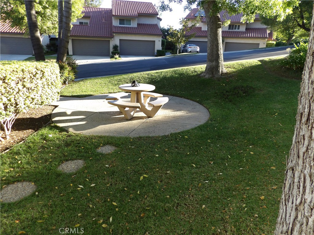 19140 Lahey Street, Unit 4 Porter Ranch, CA 91326 - Photo 4 of 22 Lots of green belts, picknick tables