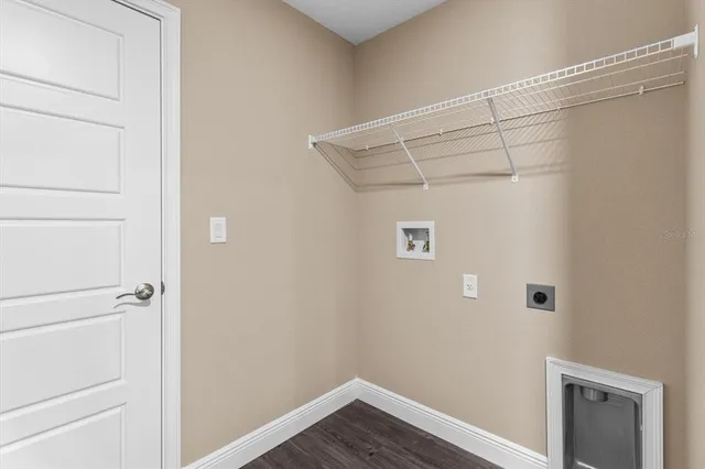 a view of small space with racks on the wall