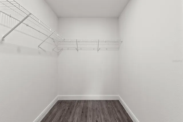 a view of a room with racks on the wall