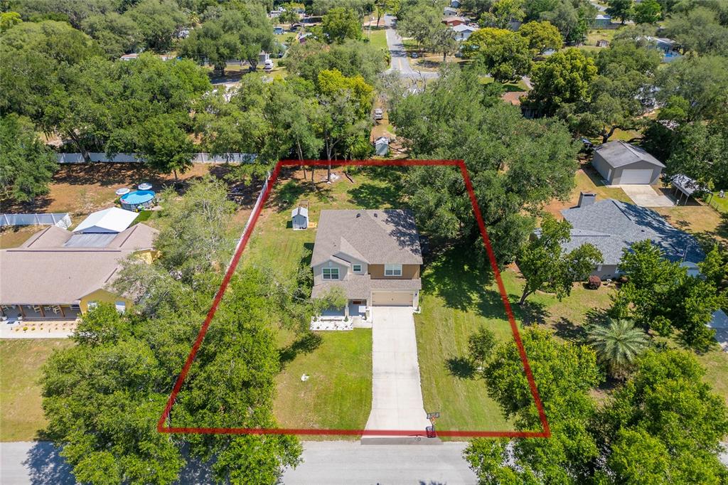 4331 Wayne Road Fruitland Park, FL 34731 - Photo 6 of 46 an aerial view of residential houses with outdoor space