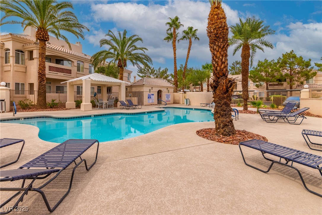 7400 West Flamingo Road, Unit 2006 Las Vegas, NV 89147 - Photo 29 of 30 Community pool featuring a patio