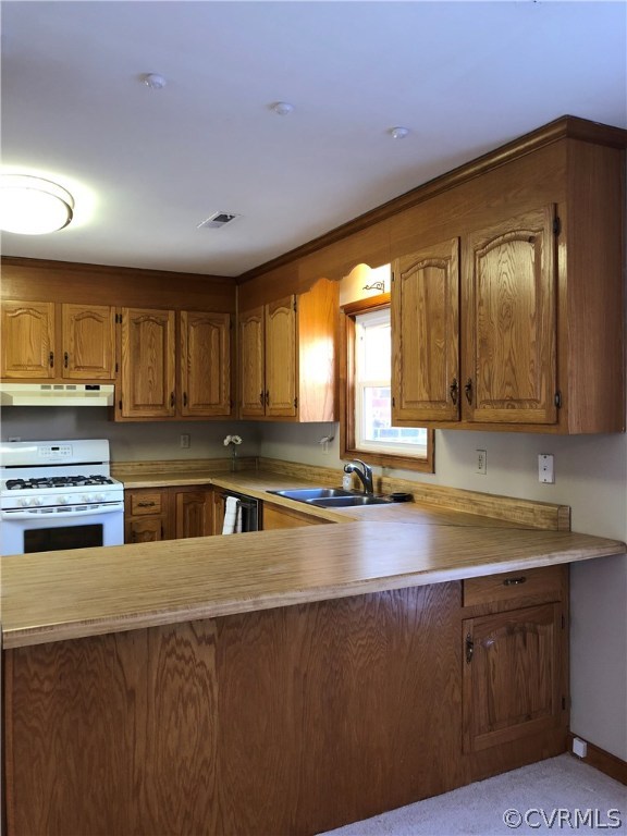 7721 Deer Run Road New Kent, VA 23124 - Photo 3 of 22 a kitchen with sink cabinets and window