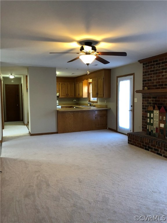 7721 Deer Run Road New Kent, VA 23124 - Photo 5 of 22 a large kitchen with a stove and a refrigerator