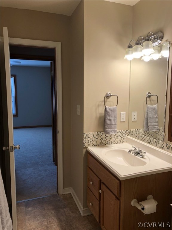 7721 Deer Run Road New Kent, VA 23124 - Photo 10 of 22 a bathroom with a sink and a mirror