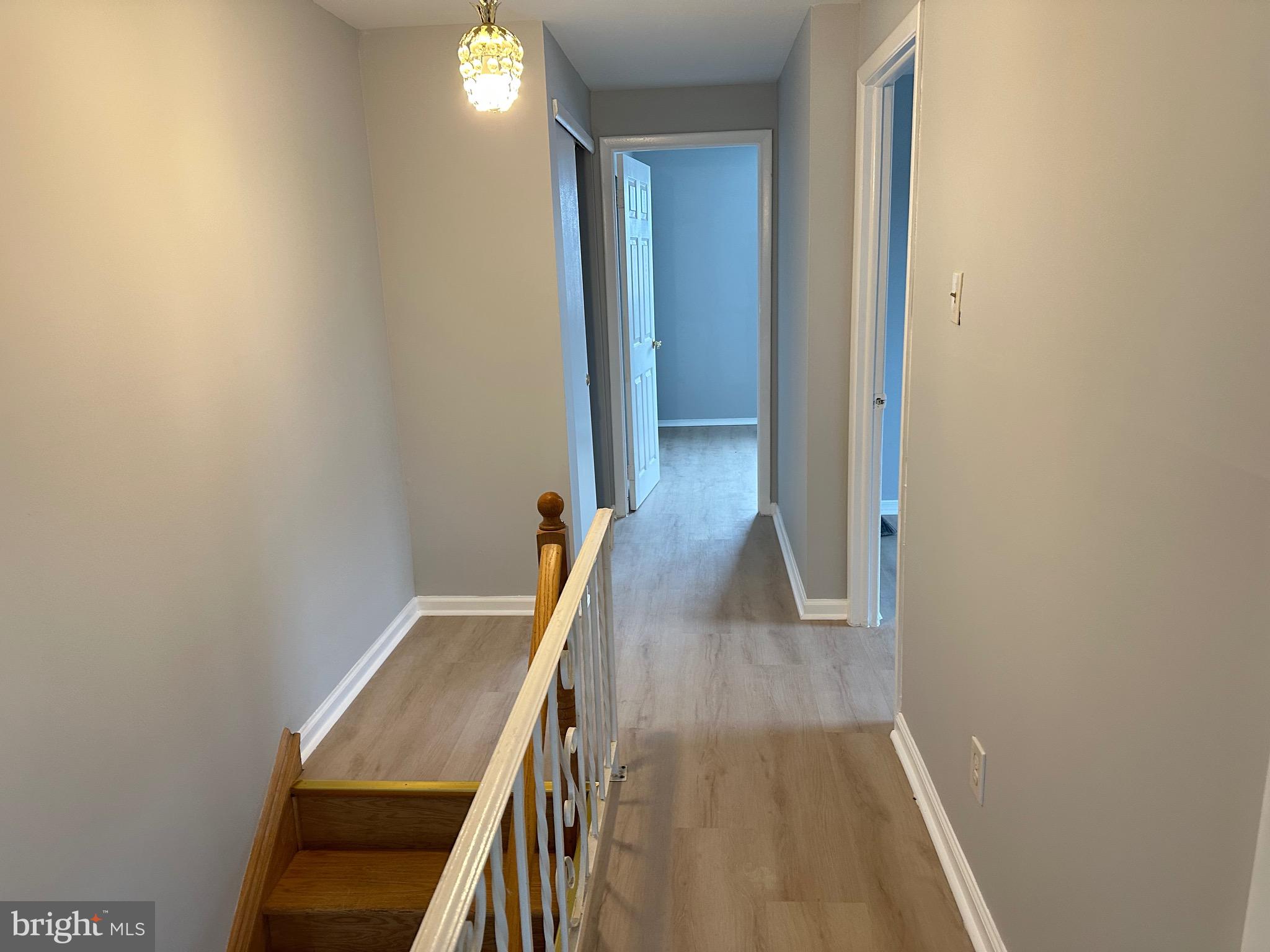 346 Ridgeway Place Philadelphia, PA 19116 - Photo 17 of 19 a view of a hallway with wooden floor