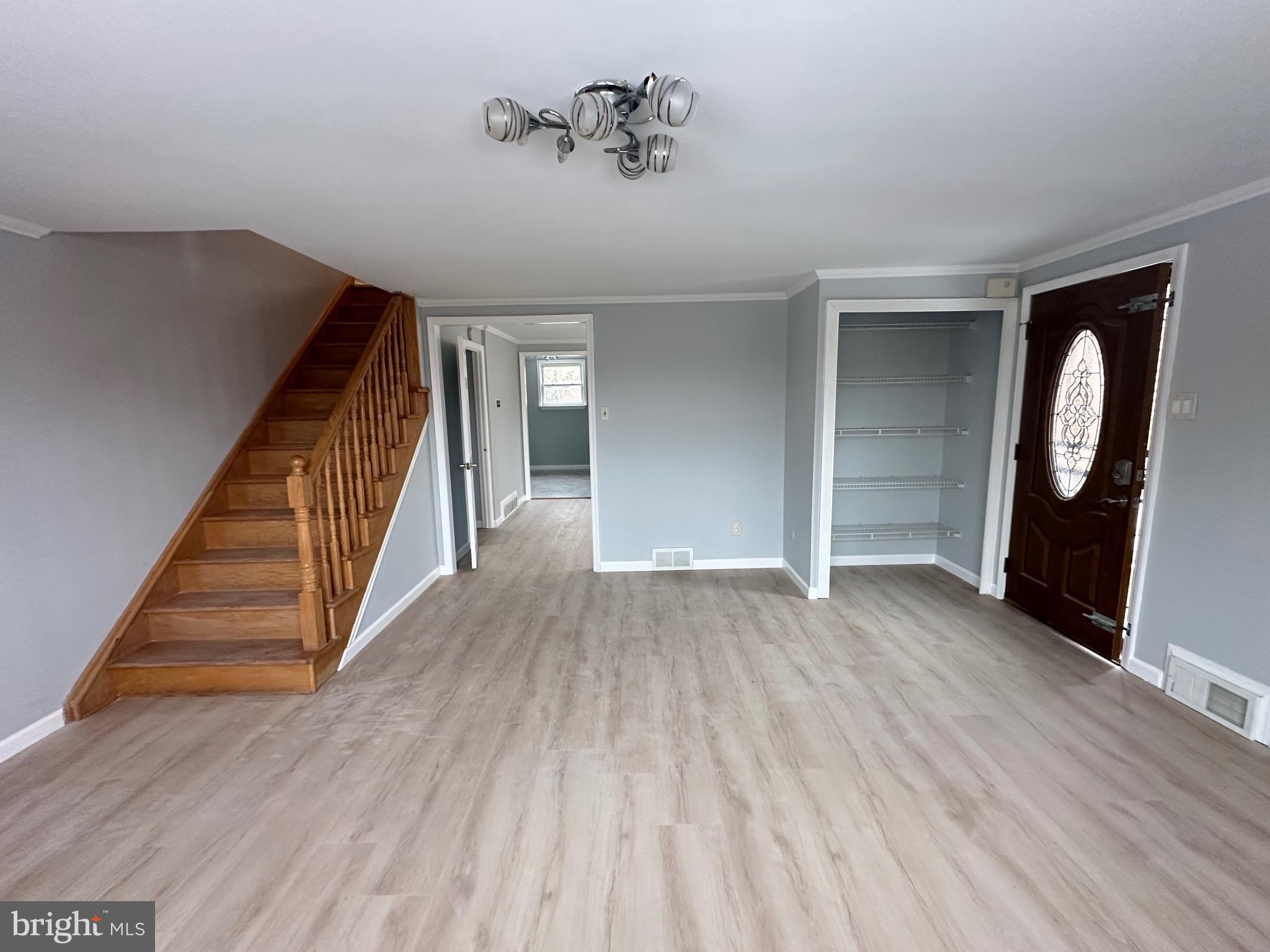 346 Ridgeway Place Philadelphia, PA 19116 - Photo 4 of 19 wooden floor in an empty room with a gallery