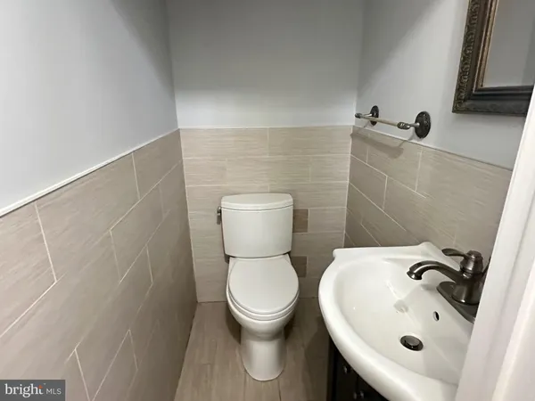 a bathroom with a sink and a toilet