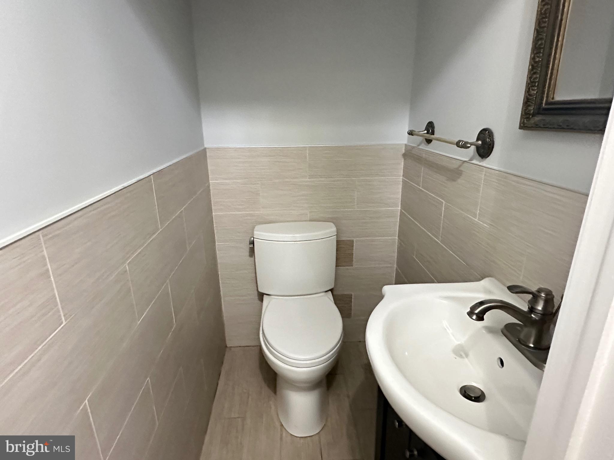 346 Ridgeway Place Philadelphia, PA 19116 - Photo 10 of 19 a bathroom with a sink and a toilet