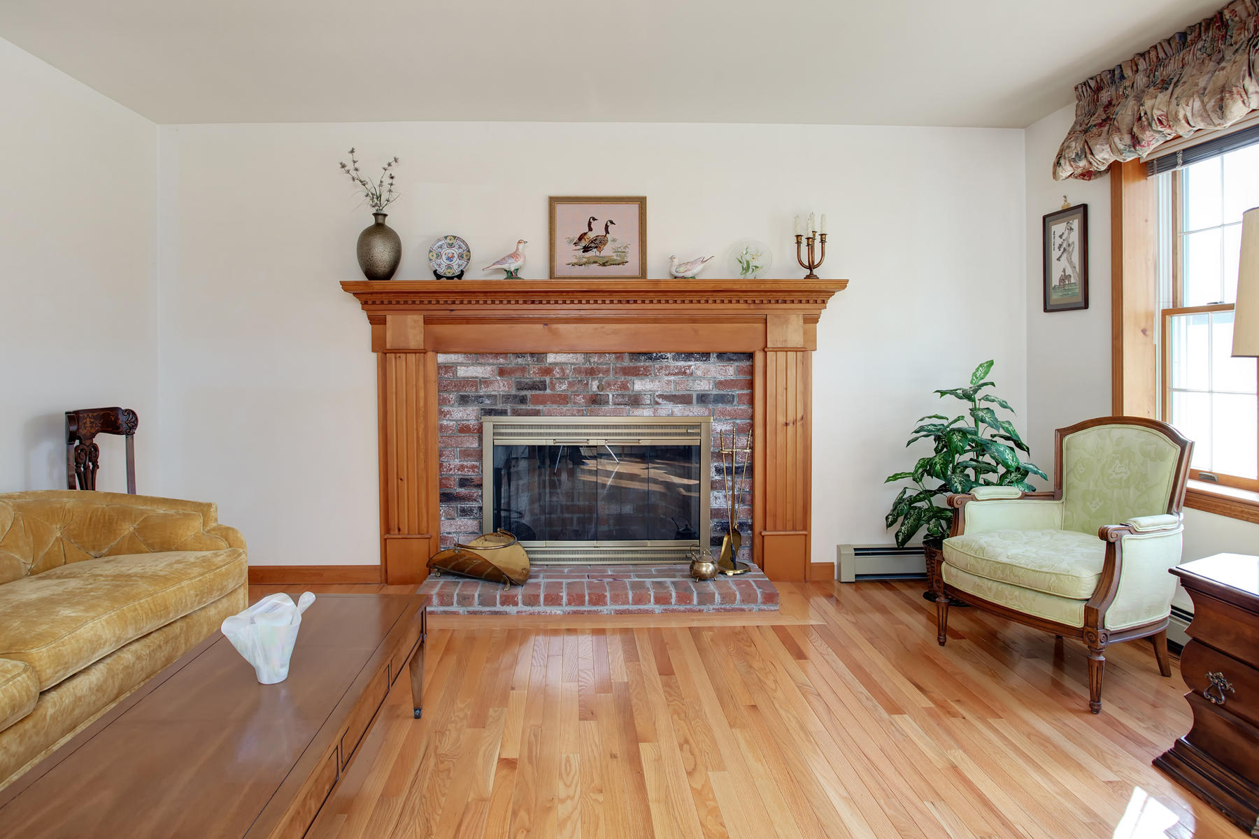 160 Camelback Road Marstons Mills, MA 02648 - Photo 8 of 27 a living room with furniture and a fireplace