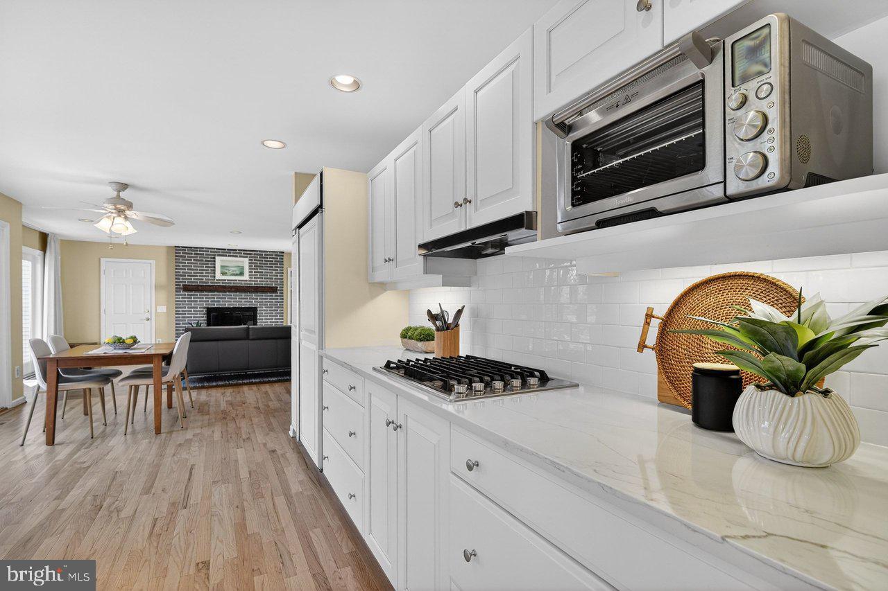 101 Mill Pond Road Belle Mead, NJ 08502 - Photo 6 of 29 Bright Kitchen with Quartz Counters & Gas Cooktop