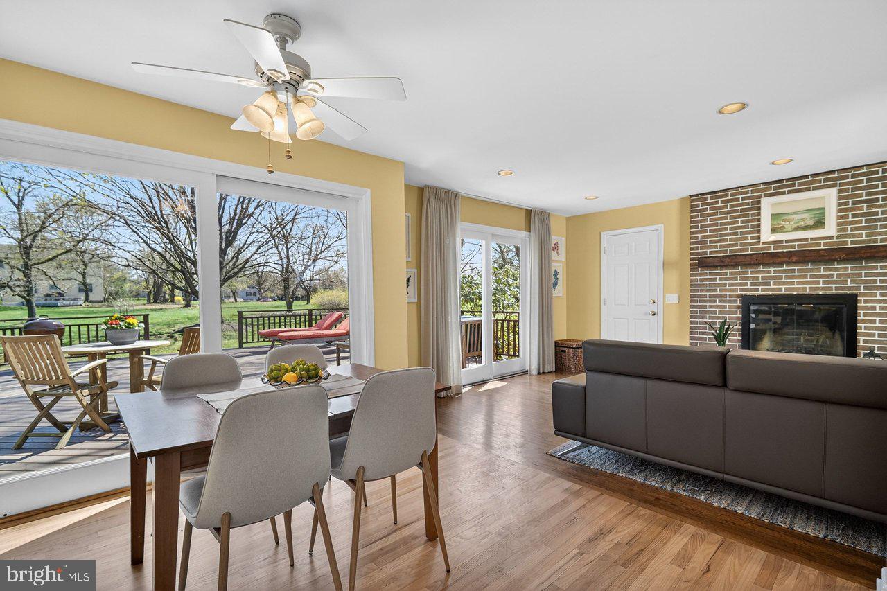 101 Mill Pond Road Belle Mead, NJ 08502 - Photo 9 of 29 Enjoy Meals with a View from 2 Slider Doors