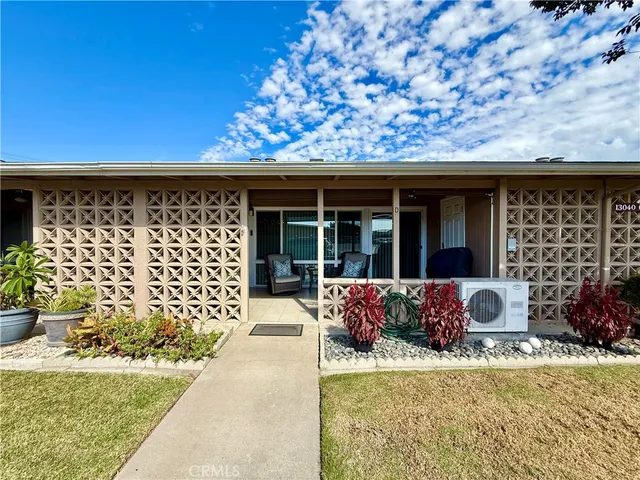 a front view of a house with a porch