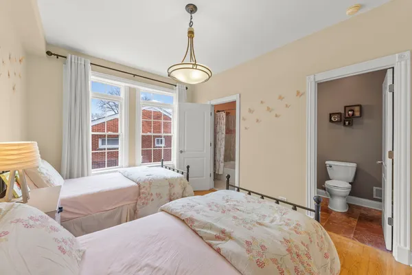 a living room with a sink and a mirror