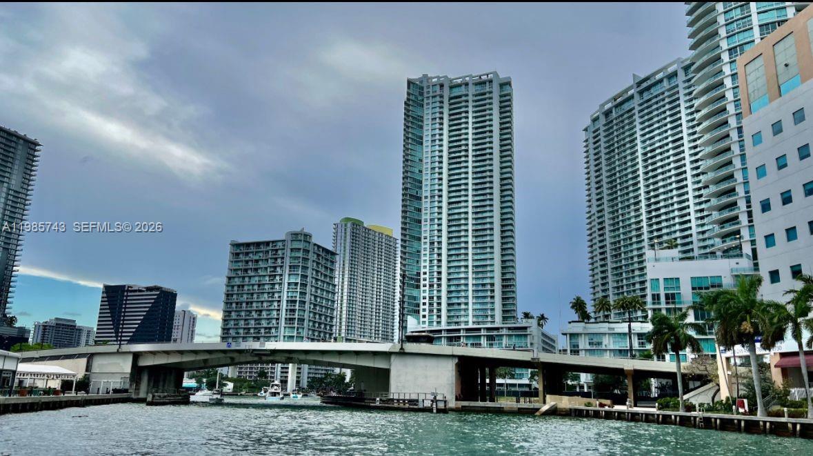 92 Southwest 3rd Street, Unit 2510 Miami, FL 33130 - Photo 13 of 31 a view of multi story residential apartment building with yard and outdoor seating