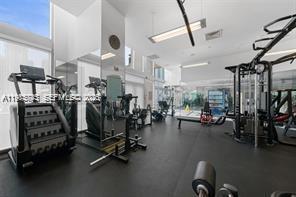 92 Southwest 3rd Street, Unit 2510 Miami, FL 33130 - Photo 24 of 31 a view of a room with gym equipment