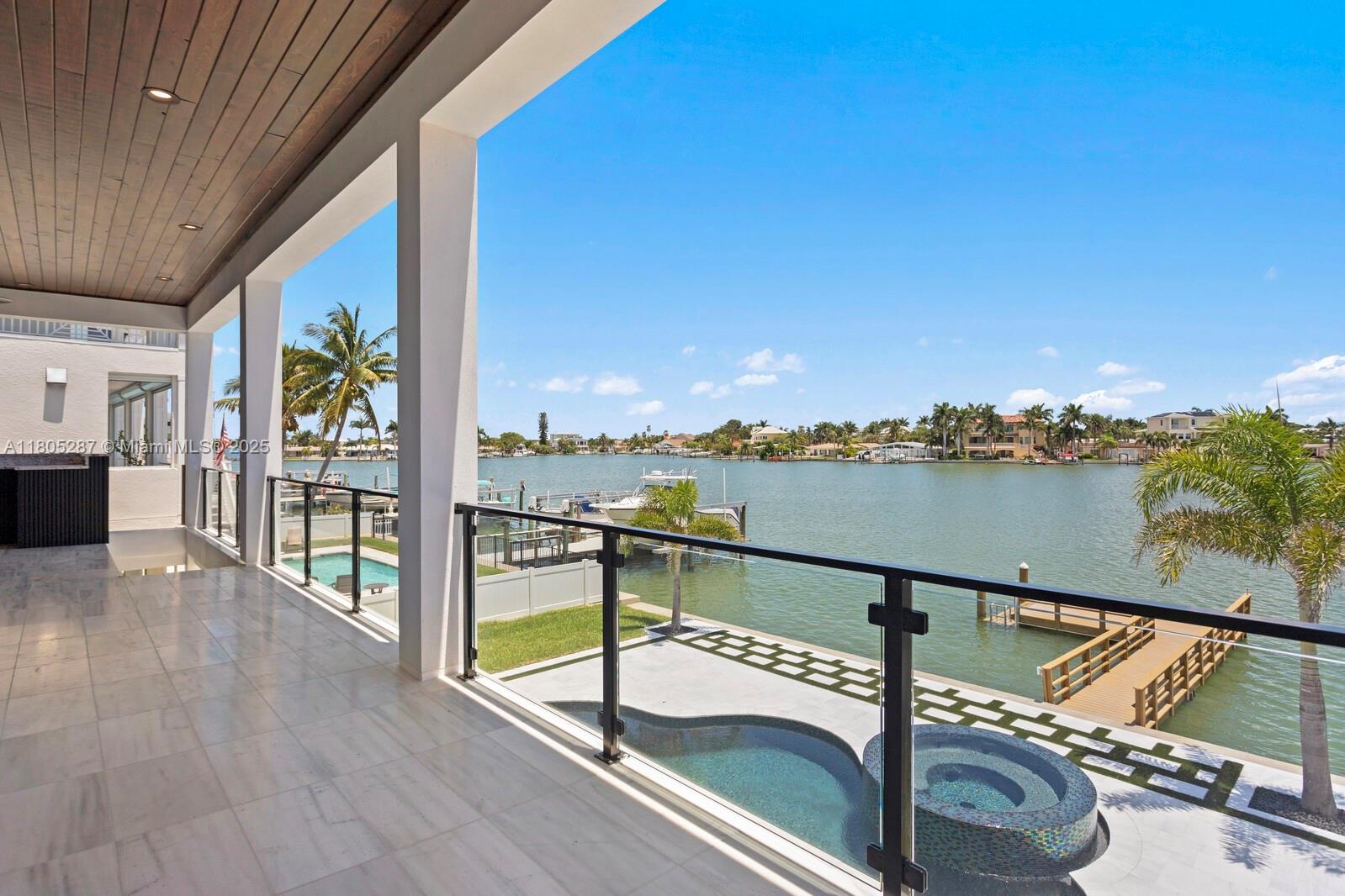 17059 Dolphin Drive St. Petersburg, FL 33708 - Photo 13 of 70 a view of ocean from a balcony