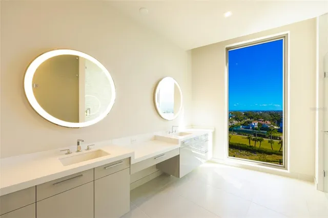 a view of living room with patio furniture and a wooden floor