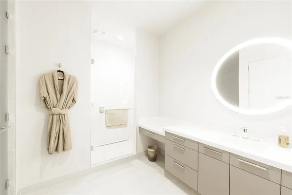 a room with furniture and a floor to ceiling window