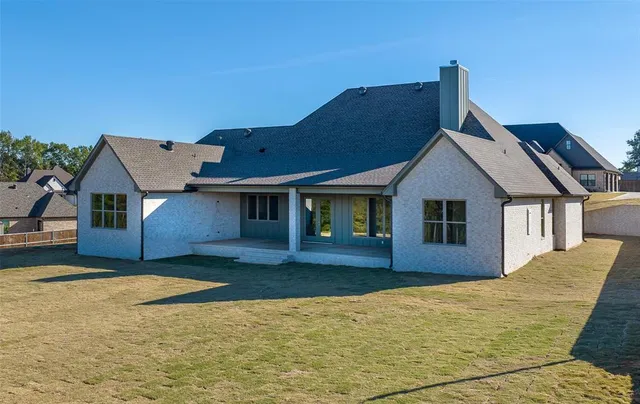 a view of a swimming pool with a lounge chairs