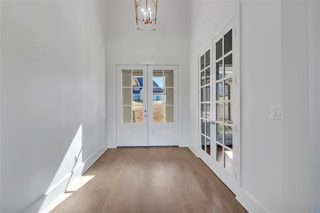 wooden floor in a room with a window