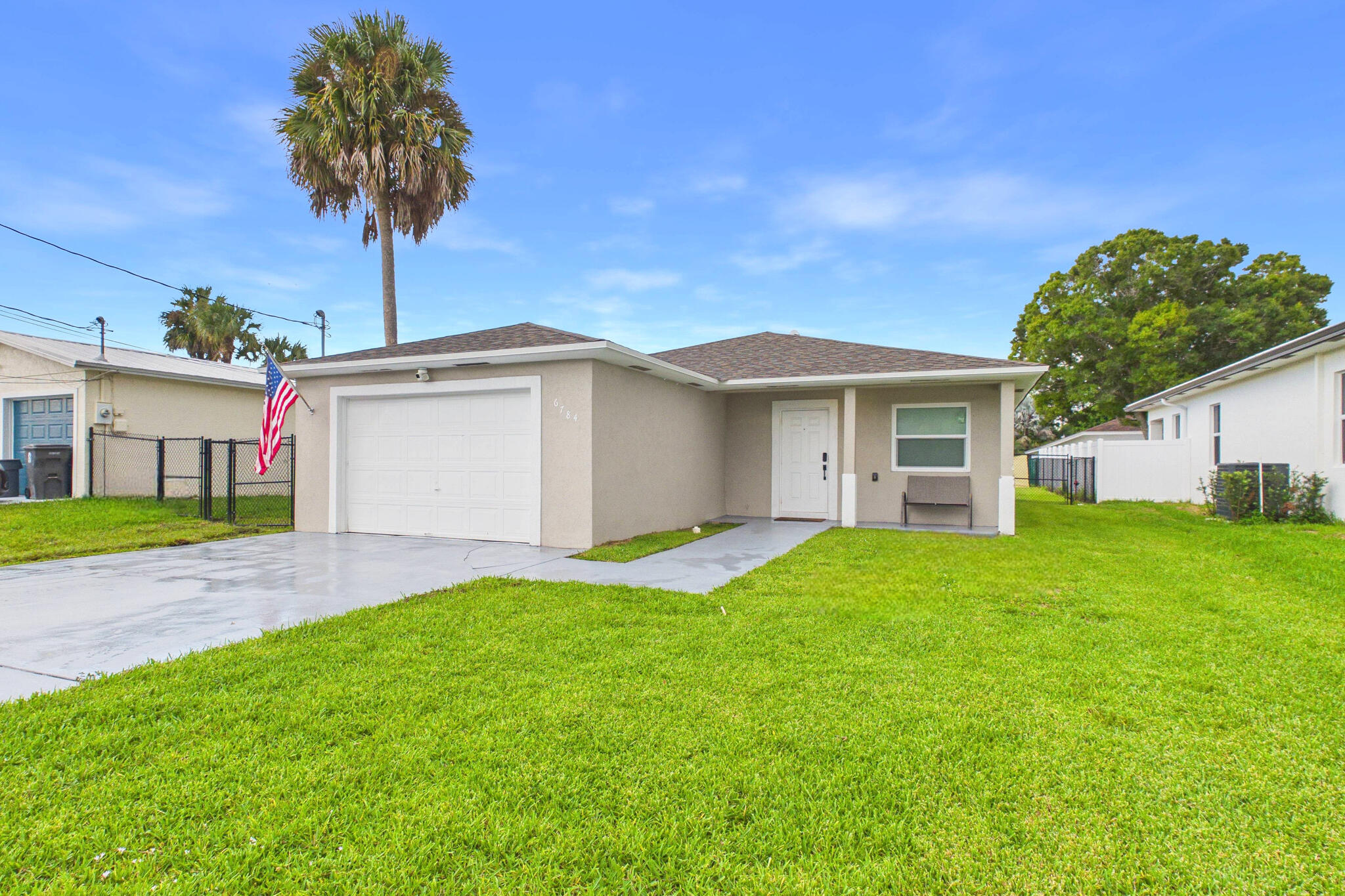6784 3rd Street Jupiter, FL 33458 - Photo 2 of 70 EXTERIOR_FRONT_8
