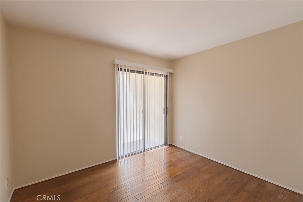 28205 Ridgepoint Court Rancho Palos Verdes, CA 90275 - Photo 12 of 33 a view of an empty room with wooden floor and a window