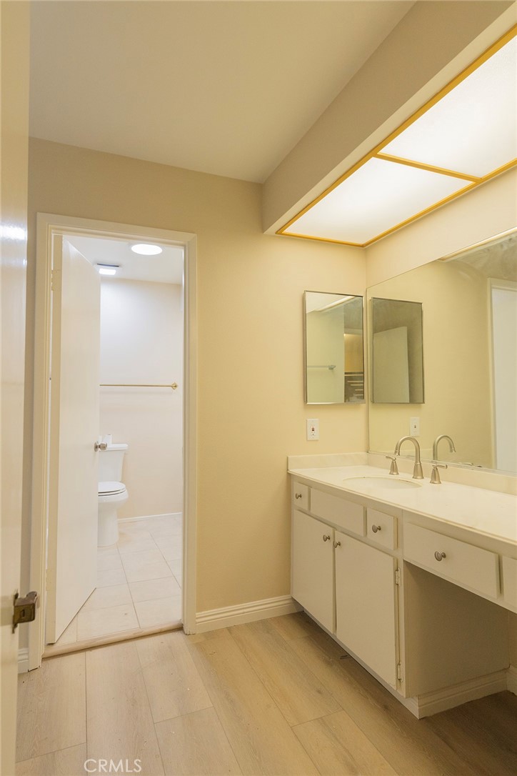 28205 Ridgepoint Court Rancho Palos Verdes, CA 90275 - Photo 20 of 33 a spacious bathroom with a double vanity sink a mirror and a