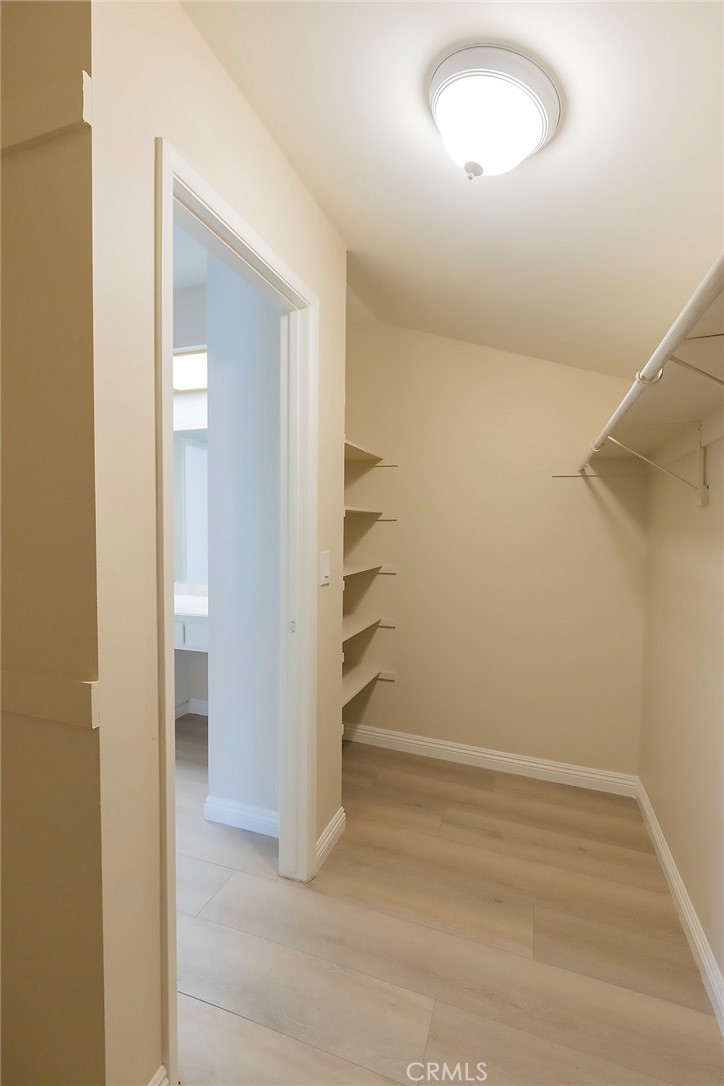 28205 Ridgepoint Court Rancho Palos Verdes, CA 90275 - Photo 23 of 33 an empty room with a hallway and wooden closet