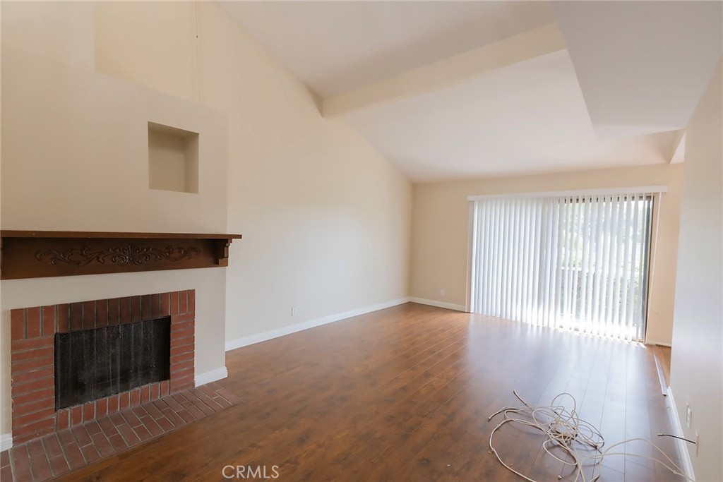 28205 Ridgepoint Court Rancho Palos Verdes, CA 90275 - Photo 4 of 33 a view of livingroom with fireplace and window
