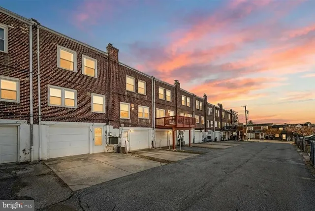 a city street lined with tall buildings