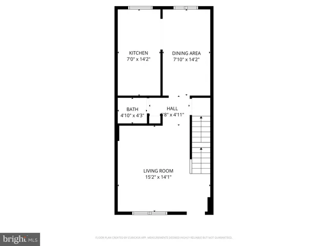 a picture of a bench in front of a wall