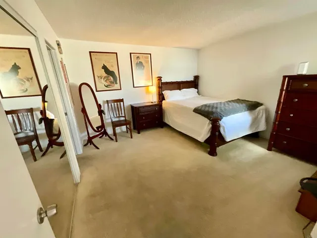 a bedroom with furniture and a couch