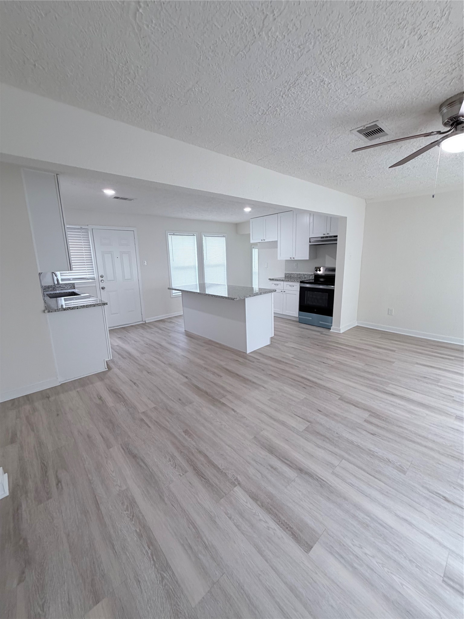 1112 3rd Street La Marque, TX 77568 - Photo 8 of 21 a view of kitchen and sink
