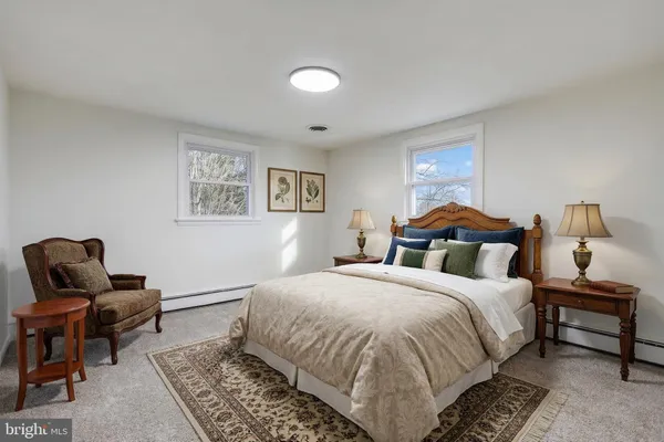 a view of an empty room with white walls
