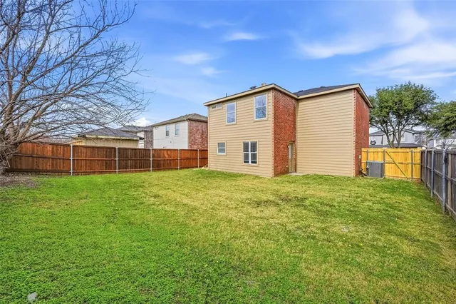 a view of a backyard with a garden