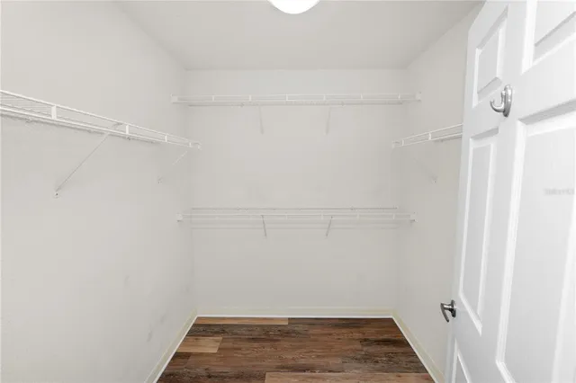 a view of a swimming pool with a yard