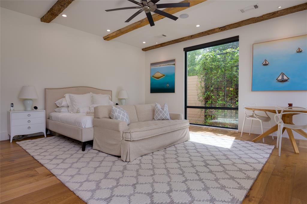 5736 Stonegate Road Dallas, TX 75209 - Photo 15 of 29 Exposed wood ceiling beams, recessed lighting, and a ceiling fan enhance the room's design