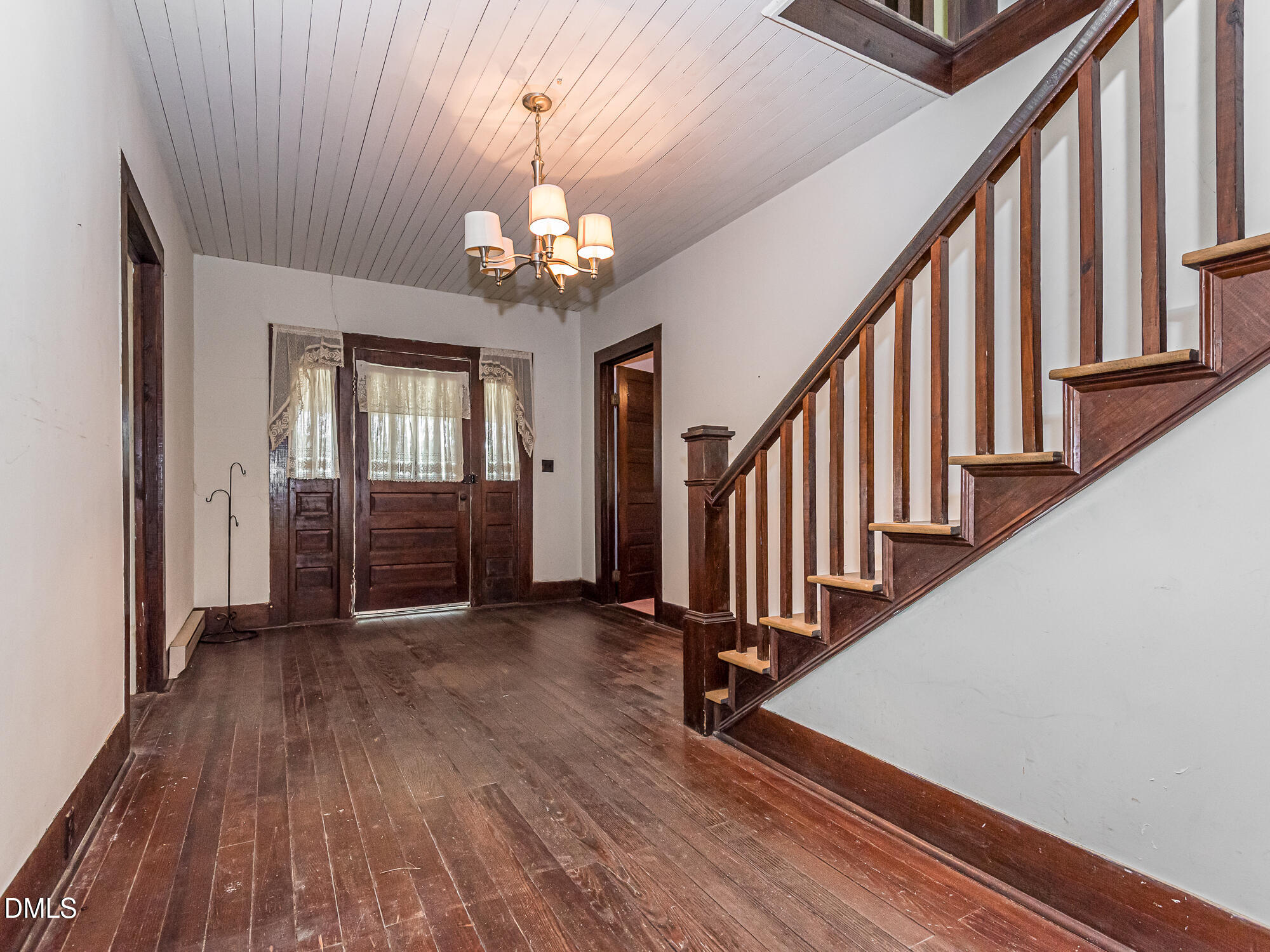 381 Royal Road Roseboro, NC 28382 - Photo 8 of 30 a view of a livingroom with wooden floor and stairs