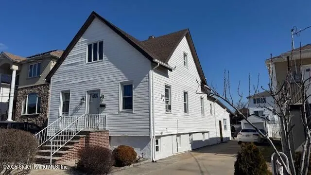 a view of a house with a large window