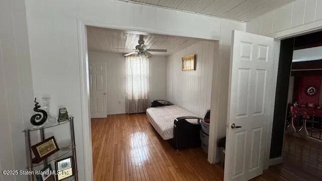 a view of an entryway with wooden floor