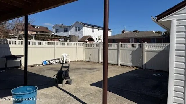 a swimming pool view with a outdoor seating