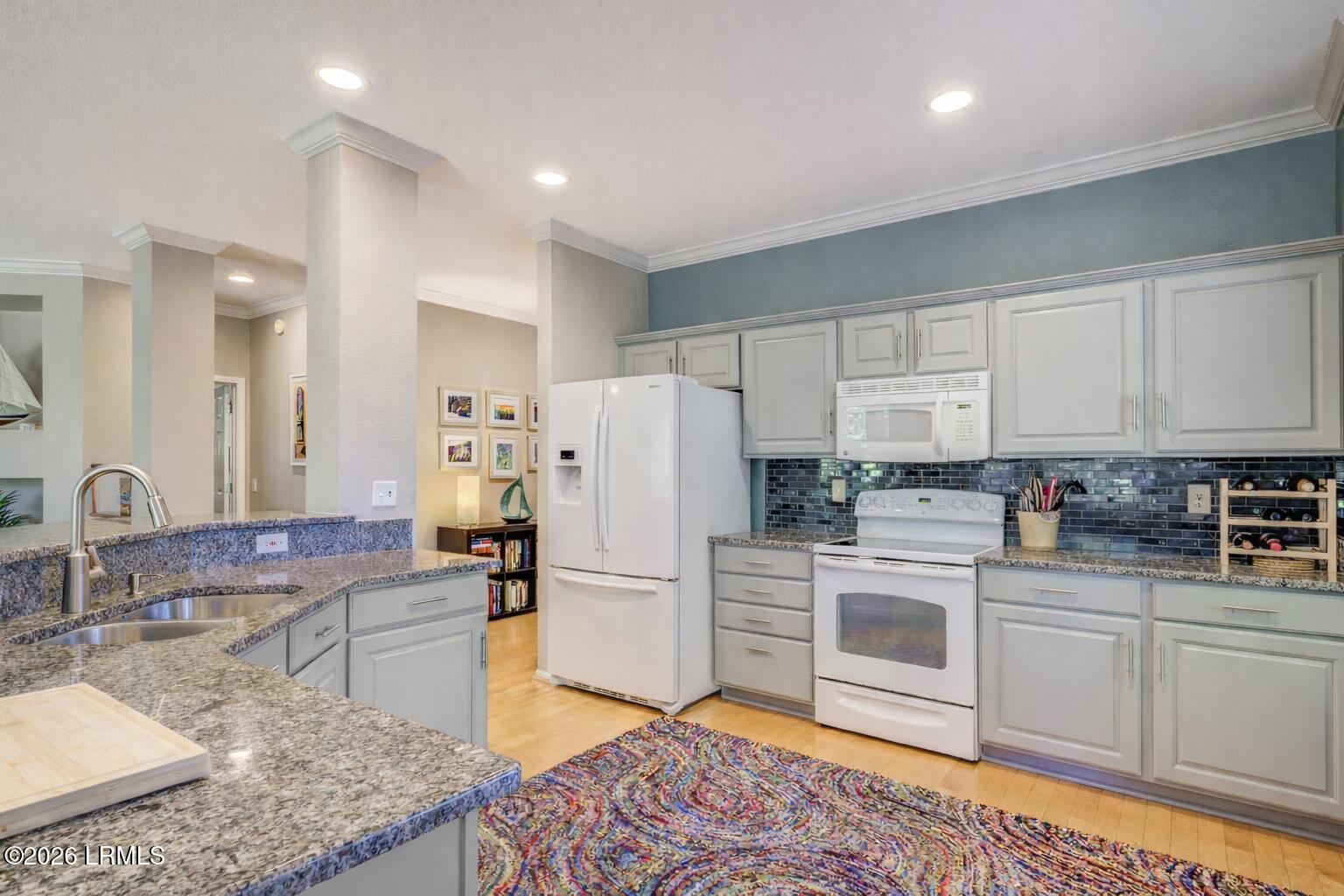 5 Pelot Court Bluffton, SC 29909 - Photo 13 of 32 Modern open kitchen with colorful accent