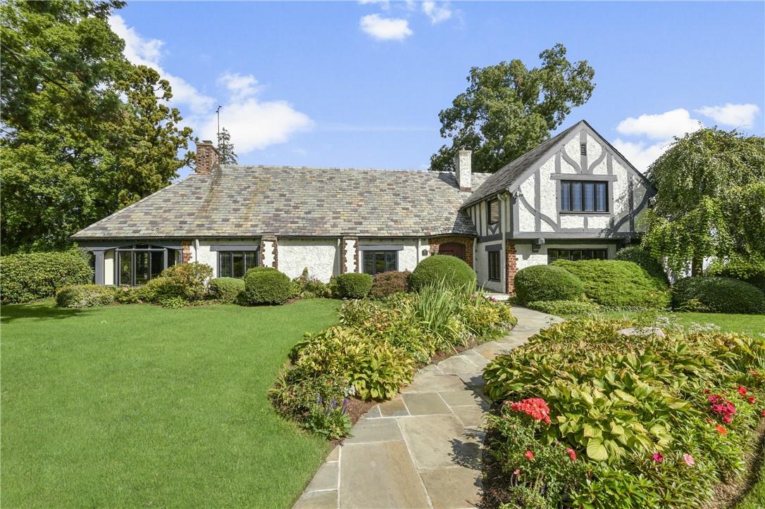 430 Orienta Avenue Mamaroneck, NY 10543 - Photo 1 of 1 a front view of a house with a garden