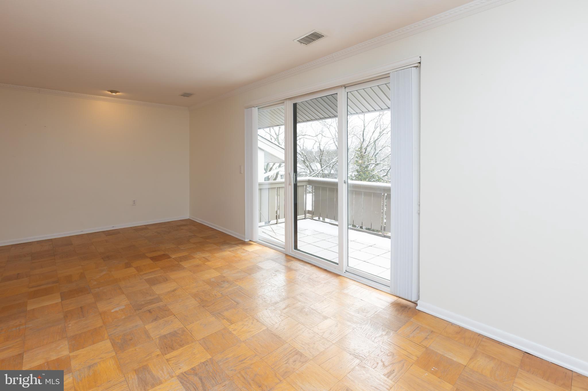 120 Cross Keys Road, Unit E Baltimore, MD 21210 - Photo 7 of 22 Balcony off of the living room