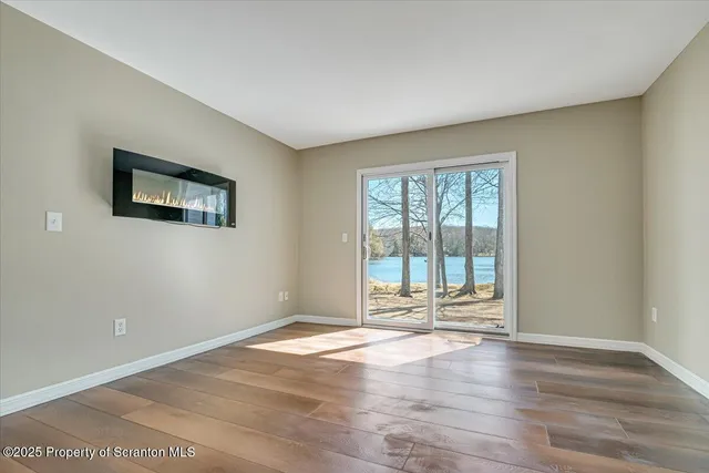 a view of a storage and utility room with washer and dryer